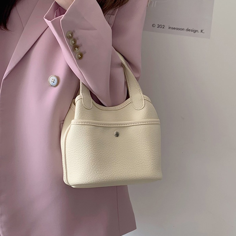 Women Bags Wholesale - エレガントな女性向け新作高級デザイナーズハンドバッグ、レディースファッションシンプルソフトレザーメッセンジャー、女性向けお手頃価格卸売バケットバッグ